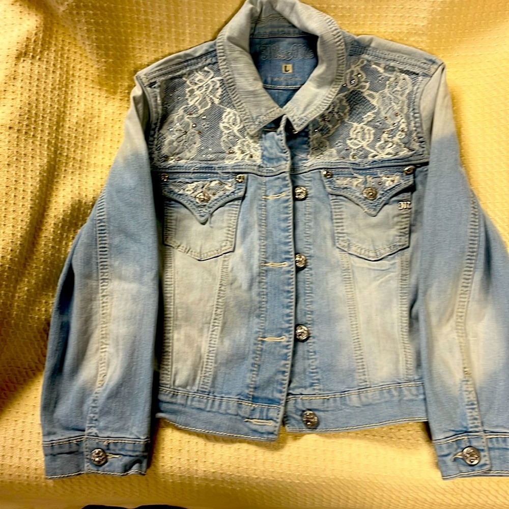 Cute denim jacket, lacy and sparkly! Adorable just doesn’t fit anymore.